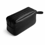 neceser de viaje de cuero negro